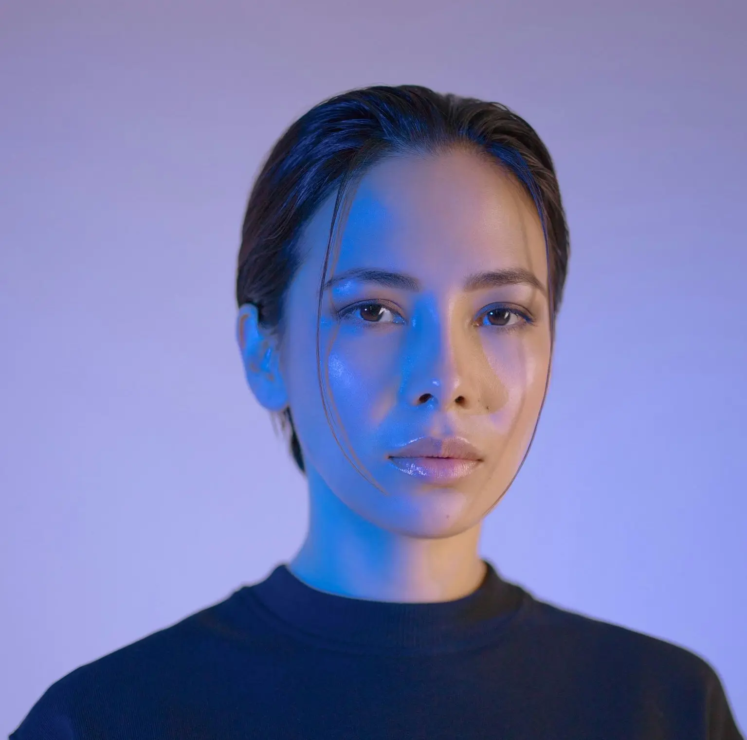 woman wearing black crew-neck shirt